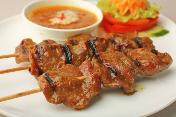 istock Assorted delicious grilled meat with vegetables isolated 1040970186