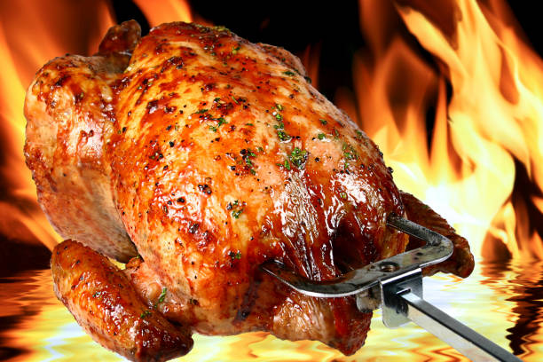 istock Assorted delicious grilled meat with vegetables over the coals on barbecue 1040971254