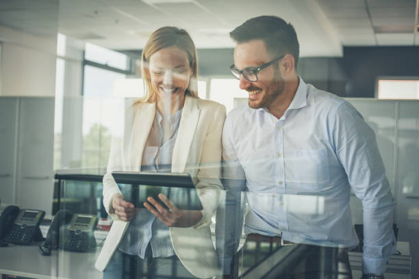 istock Business people standing in office. 1040971808