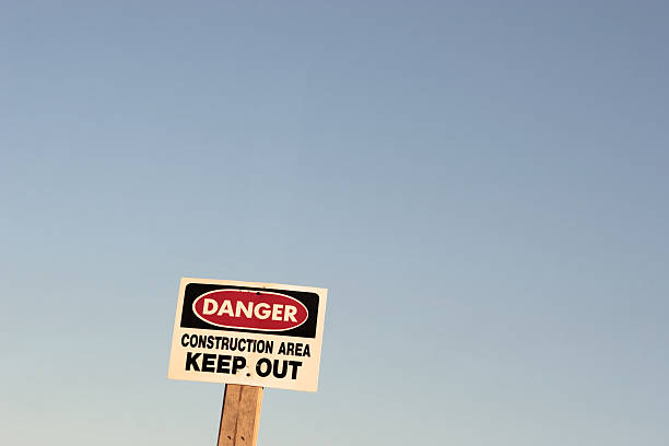istock Danger sign, construction area, keep out, against a blue sky 104097529
