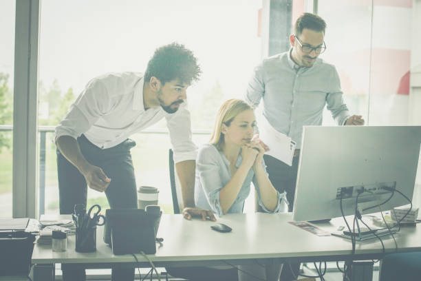 istock Business people at the office. 1040975476