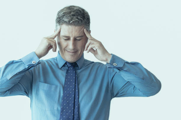 istock Stressed businessman suffering from migraine 1040985398