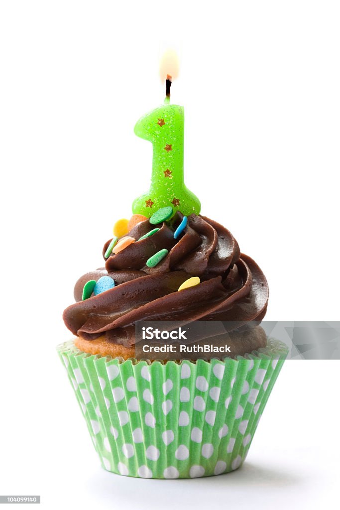 A child's first birthday cupcake isolated on white Cupcake decorated with chocolate frosting and a green candle

Please see my portfolio for lots more cupcakes -

[url=file_closeup.php?id=12626506][img]file_thumbview_approve.php?size=1&id=12626506[/img][/url] [url=file_closeup.php?id=12453023][img]file_thumbview_approve.php?size=1&id=12453023[/img][/url] [url=file_closeup.php?id=12435068][img]file_thumbview_approve.php?size=1&id=12435068[/img][/url] [url=file_closeup.php?id=12422070][img]file_thumbview_approve.php?size=1&id=12422070[/img][/url] [url=file_closeup.php?id=12113757][img]file_thumbview_approve.php?size=1&id=12113757[/img][/url] [url=file_closeup.php?id=10513135][img]file_thumbview_approve.php?size=1&id=10513135[/img][/url] [url=file_closeup.php?id=10384632][img]file_thumbview_approve.php?size=1&id=10384632[/img][/url] [url=file_closeup.php?id=9847065][img]file_thumbview_approve.php?size=1&id=9847065[/img][/url] [url=file_closeup.php?id=10346189][img]file_thumbview_approve.php?size=1&id=10346189[/img][/url] [url=file_closeup.php?id=9484913][img]file_thumbview_approve.php?size=1&id=9484913[/img][/url] [url=file_closeup.php?id=9294300][img]file_thumbview_approve.php?size=1&id=9294300[/img][/url] [url=file_closeup.php?id=8704115][img]file_thumbview_approve.php?size=1&id=8704115[/img][/url] [url=file_closeup.php?id=8594501][img]file_thumbview_approve.php?size=1&id=8594501[/img][/url] [url=file_closeup.php?id=8404032][img]file_thumbview_approve.php?size=1&id=8404032[/img][/url] [url=file_closeup.php?id=8458601][img]file_thumbview_approve.php?size=1&id=8458601[/img][/url] [url=file_closeup.php?id=8481170][img]file_thumbview_approve.php?size=1&id=8481170[/img][/url] [url=file_closeup.php?id=8838338][img]file_thumbview_approve.php?size=1&id=8838338[/img][/url] [url=file_closeup.php?id=9643063][img]file_thumbview_approve.php?size=1&id=9643063[/img][/url] [url=file_closeup.php?id=12653517][img]file_thumbview_approve.php?size=1&id=12653517[/img][/url] First Birthday Stock Photo