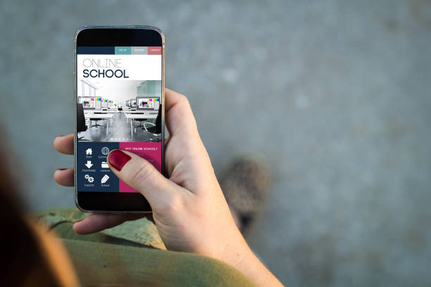 istock Woman walking smartphone online school interface 1040993644