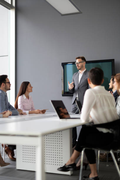 istock Group of architects and business people working together 1040998398