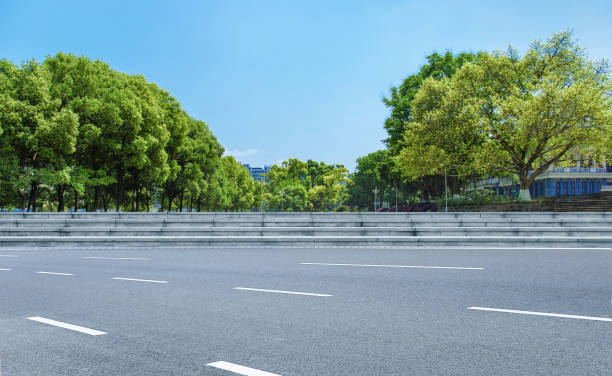 istock City park and clean asphalt road 1040998684
