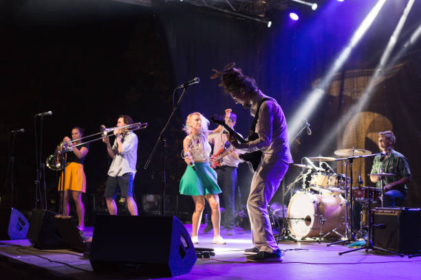 istock Rock group playing on the concert 1040999008
