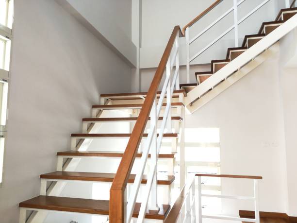 istock Elegant staircase pattern and wood in the house. 1040999116
