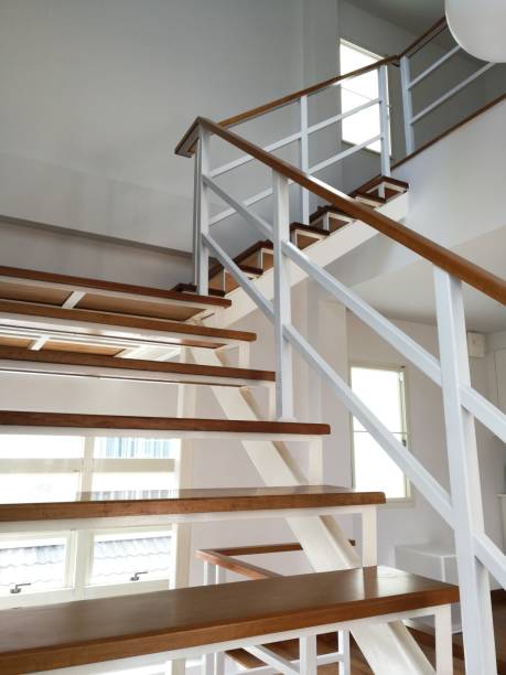 istock Elegant staircase pattern and wood in the house. 1040999488