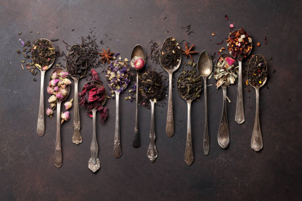 istock Various tea in spoons. Black, green and red tea 1040999668
