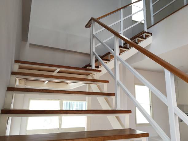 istock Elegant staircase pattern and wood in the house. 1041000272