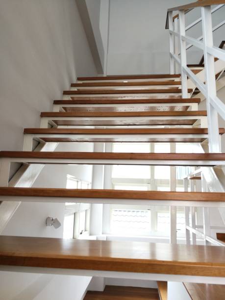 istock Elegant staircase pattern and wood in the house. 1041000342