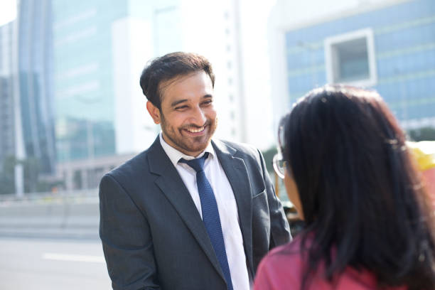 istock Business colleagues discussing outdoors 1041004156