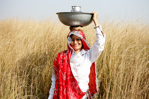 Indian women portrait near pampas grass.