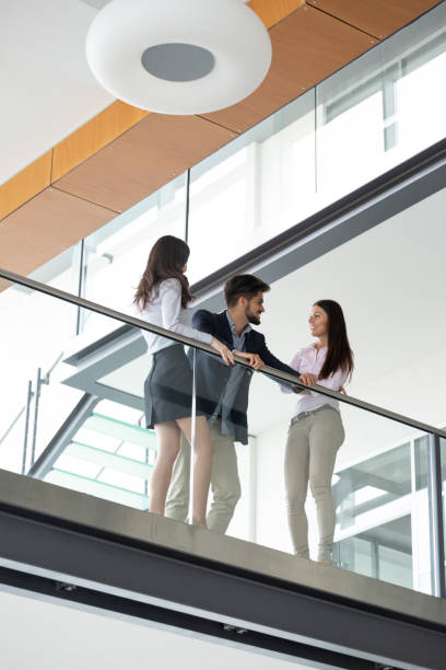 istock Business people working together in office hall. 1041005306