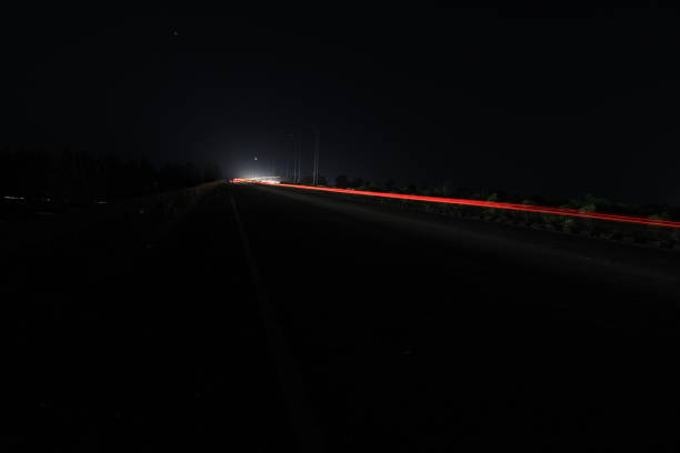 istock Traffic at night on highway 1041005322