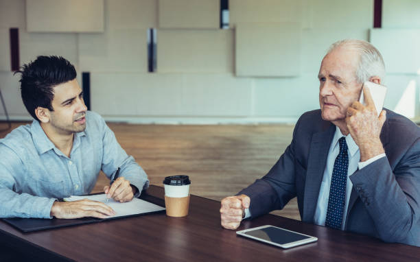 istock Disappointed manager talking to business partner 1041006196