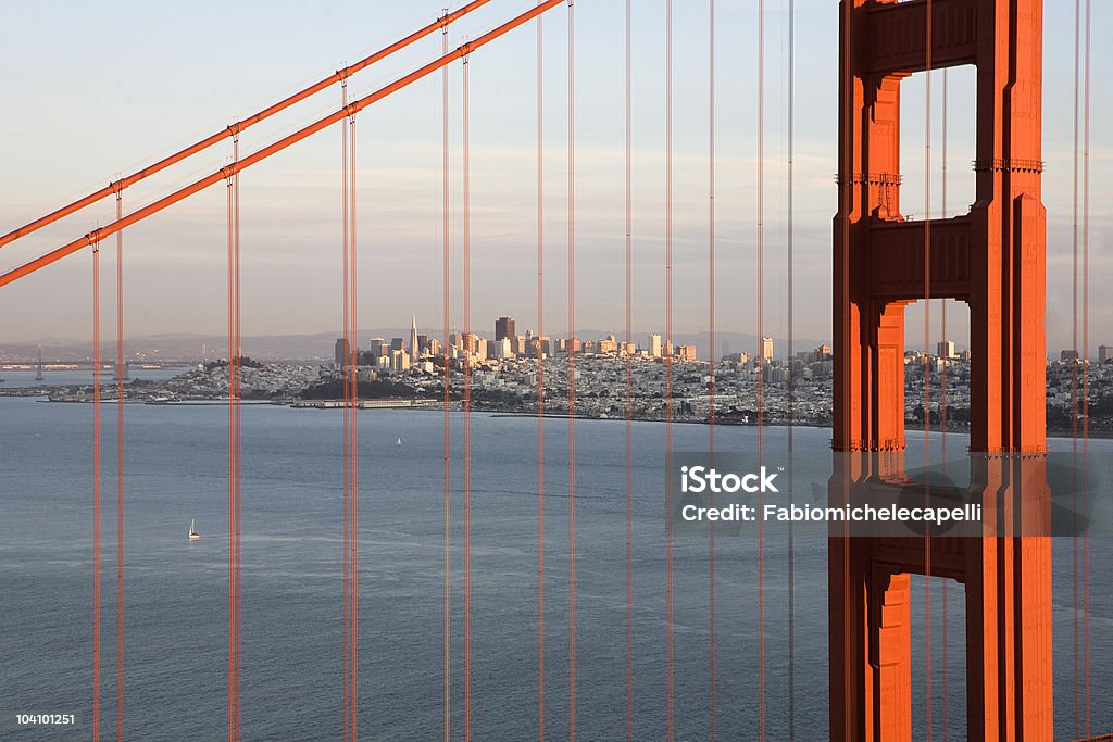 Golden Gate and San Francisco in the background Golden Gate and San Francisco in the background at sunset Bridge - Built Structure Stock Photo