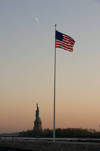 istock American flag with Statue of Liberty 104101480