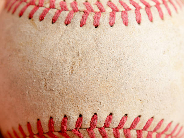 istock Sports Equipment old Baseball background texture 1041020392