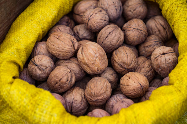 istock Background of a walnut in a wicker basket 1041027774