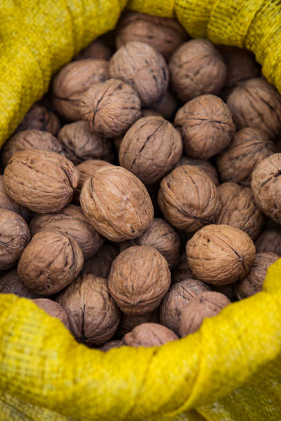 istock Background of a walnut in a wicker basket 1041027860