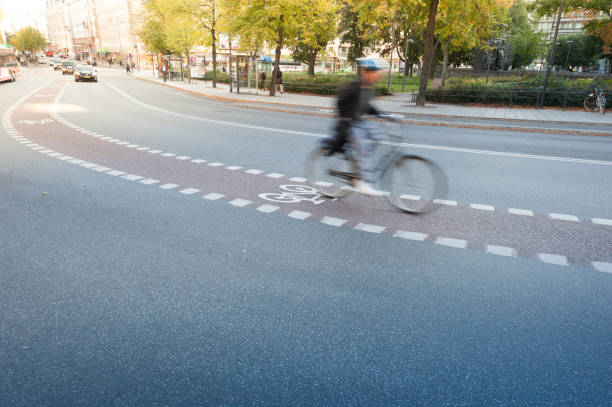 istock Bicycle in bike lane and traffic, evening, fall 1041029376