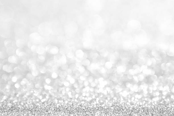 istock abstract background white Silver lights on christmas bokeh 1041033544