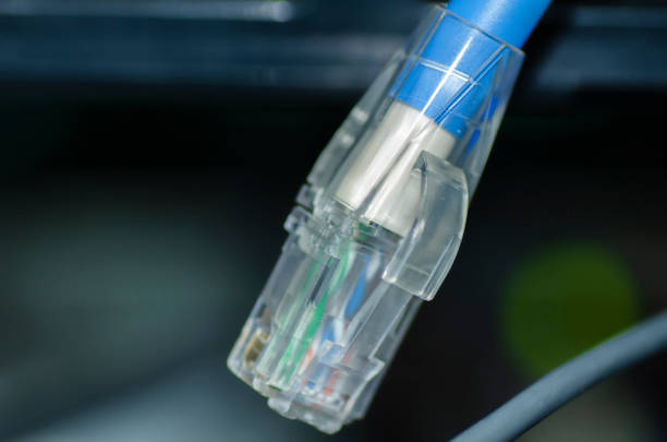 istock close-up image of Ethernet cord RJ45 for network and internet connection.selective focus shot 1041041914