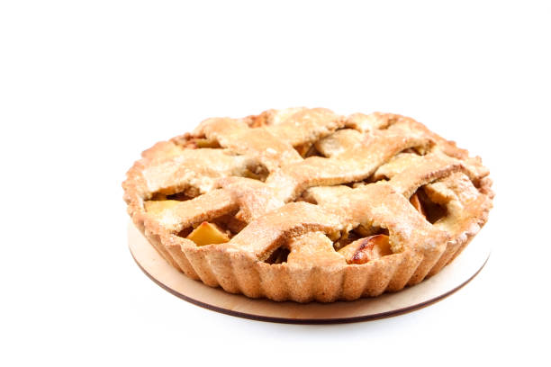 istock Pastry product with apple stuffing, appetizing golden crust. 1041058778