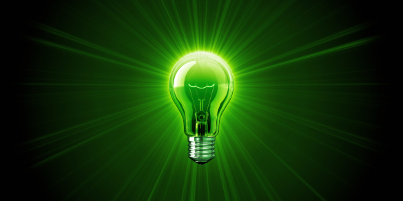 Shine of Green Light Bulb. Business background. The image can be croped easily. 3D render.