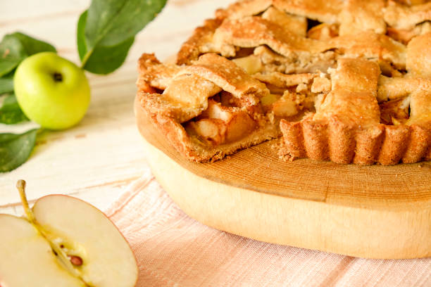 istock Pastry product with apple stuffing, appetizing golden crust. 1041062786