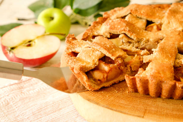 istock Pastry product with apple stuffing, appetizing golden crust. 1041062826
