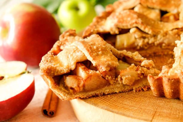 istock Pastry product with apple stuffing, appetizing golden crust. 1041062928