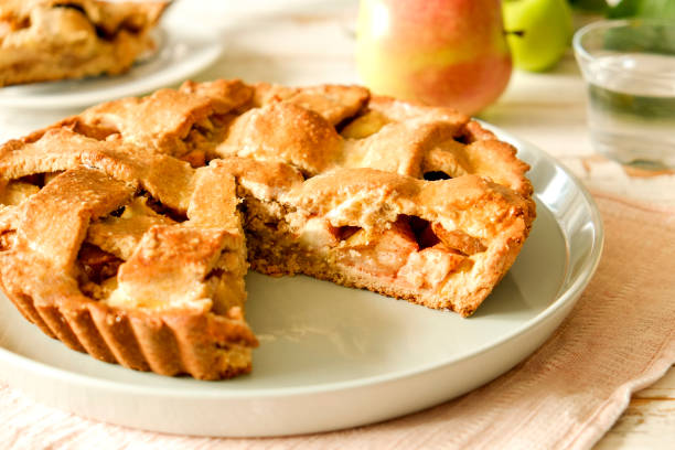 istock Pastry product with apple stuffing, appetizing golden crust. 1041062964