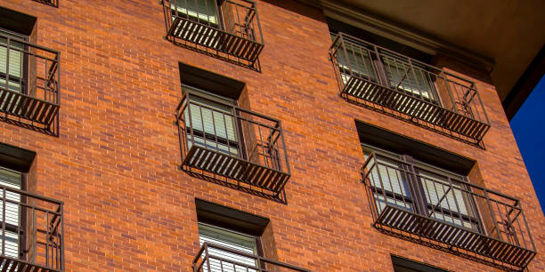 istock Balconies of a red brick building 1041063078