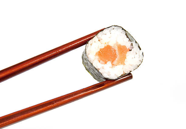 istock Sushi and chopsticks, isolated on white 104106341