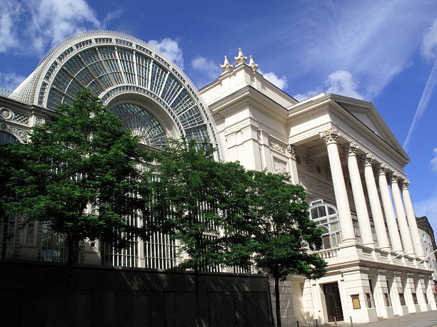 Royal Opera House and the Floral Hall Extension The Royal Opera House and the Floral Hall Extension at London's Covent Garden is the home of the Royal Opera and the Royal Ballet covent garden photos stock pictures, royalty-free photos & images