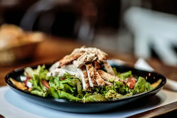 Photo of Plate with food on the table