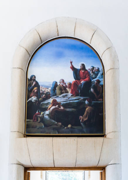 Tiberias, Israel, September 10, 2018 : A drawing on the wall with a plot, as Jesus preaches to people over the exit to the  Beatitude Monastery located on the mountain on the coast of the Sea of Galilee - Kinneret