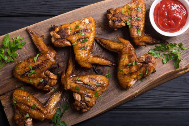 istock Grilled chicken wings with tomato sauce 1041075668