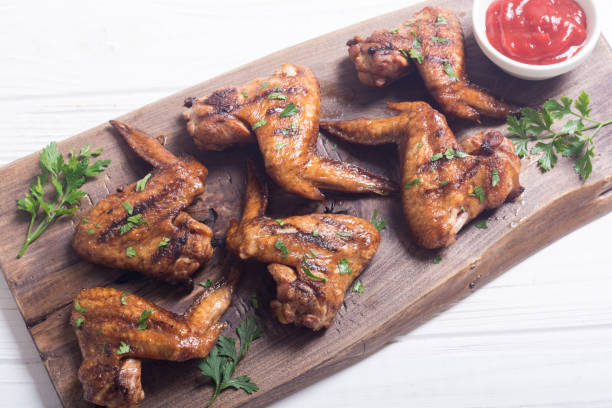 istock Grilled chicken wings with tomato sauce 1041075744