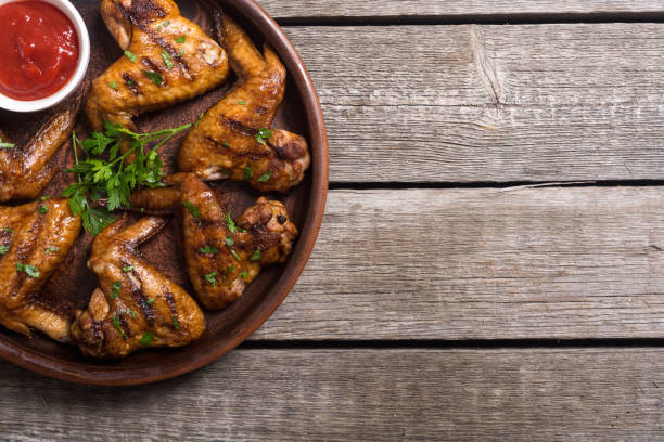 istock Grilled chicken wings with tomato sauce 1041075782