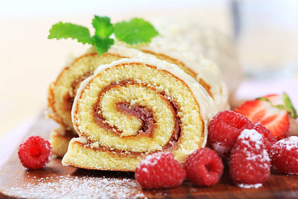istock Swiss roll dessert cut in half with berries 104107669