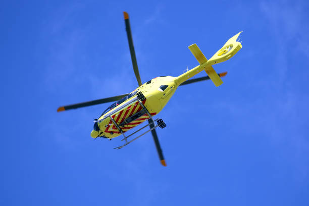 istock The helicopter flies in the sky 1041081966