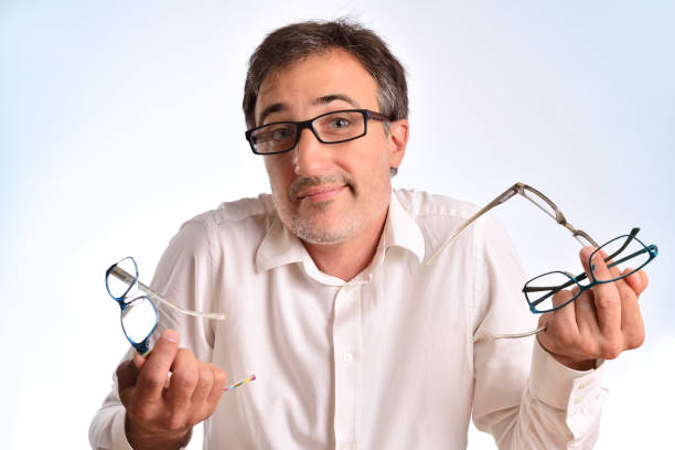 istock Optical business man shrugging shoulders with several eyeglasses 1041087434