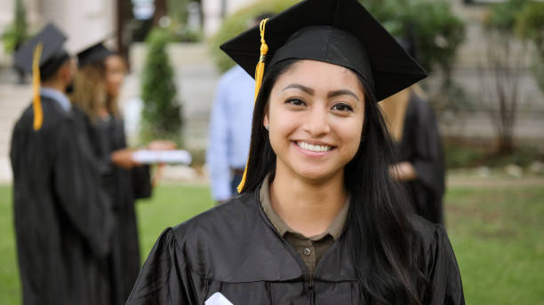 istock Confident female college graduate 1041088068