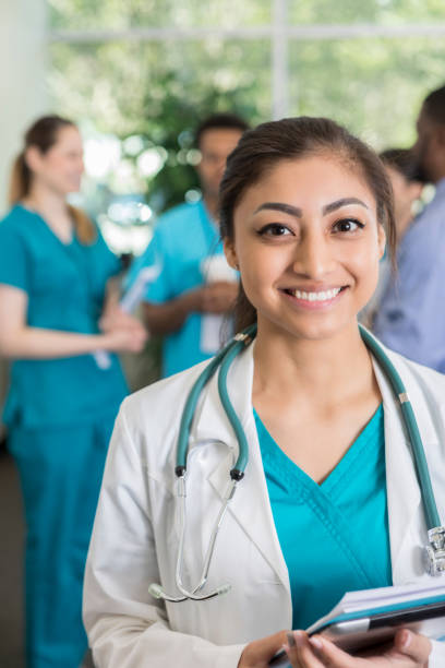 istock Young female medical student smiles for camera 1041088164