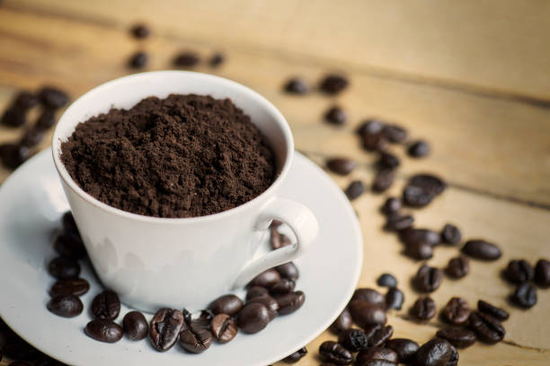 istock Cup with ground coffee and coffee beans 1041088724