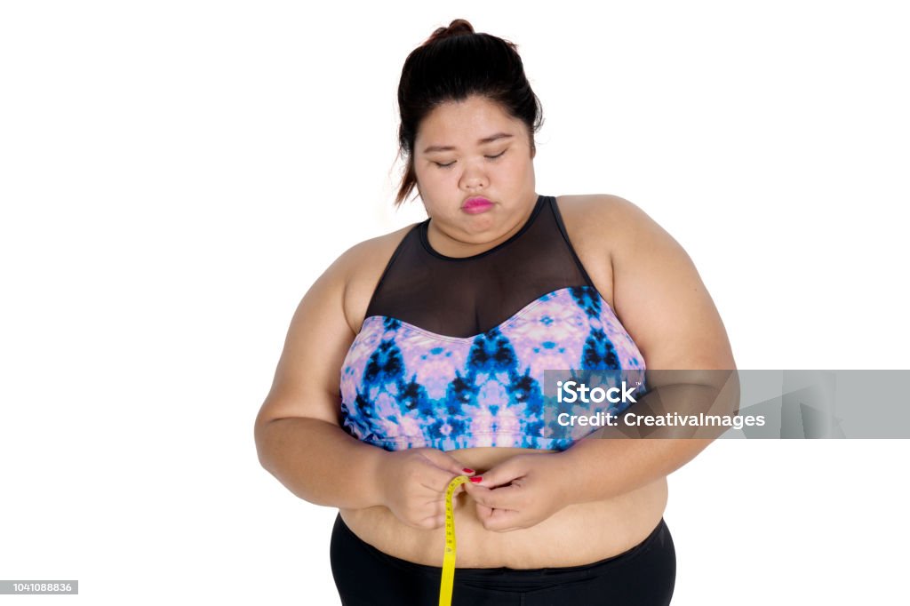 그녀의 배를 측정 하는 불행 한 뚱뚱한 여자 과체중에 대한 스톡 사진 및 기타 이미지 - 과체중, 마음이 산란해진, 무게 - iStock 그녀의 배를 측정 하는 불행 한 뚱뚱한 여자 과체중에 대한 스톡 사진 및 기타 이미지 - 과체중, 마음이 산란해진, 무게 - Istock